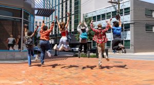 Students jumping for joy after successful results from the best SAT Preparation Class.