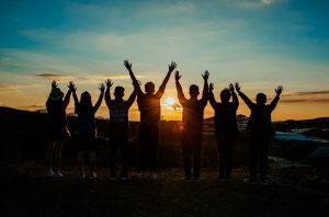 College students gathered to watch a sunset.