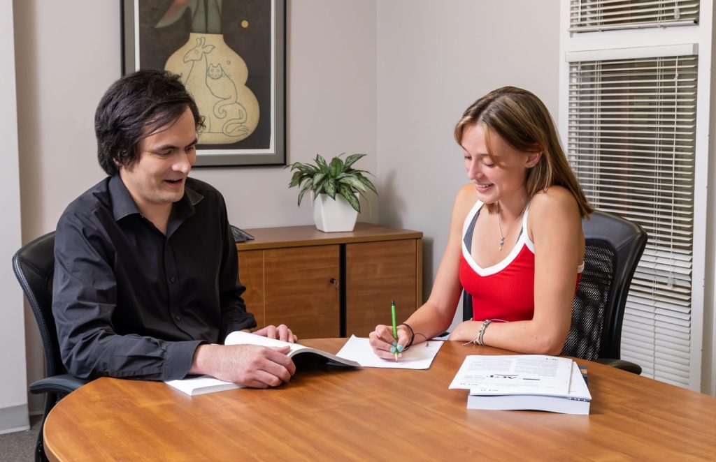 AP English tutor helping a high school student.