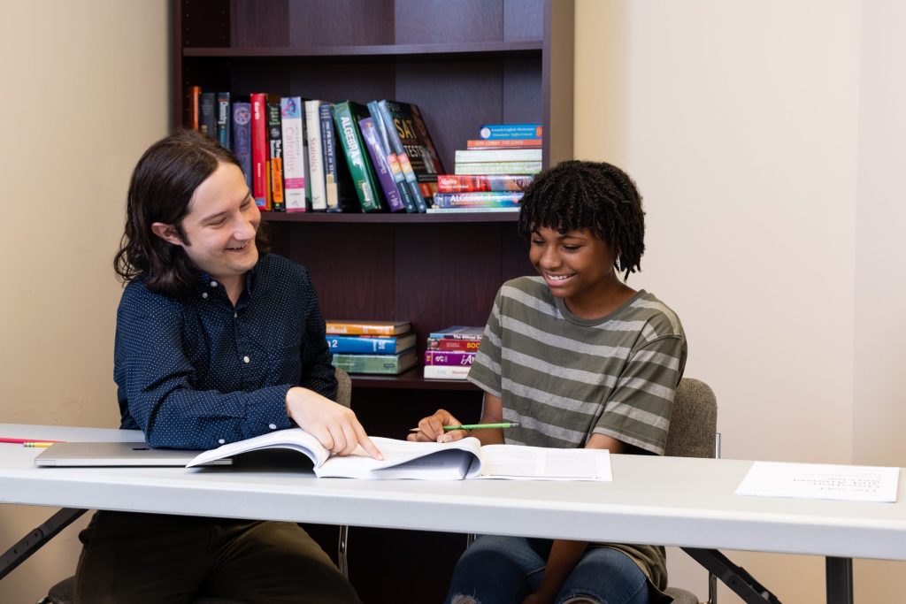 A D.C. area tutor helps a student with their history class.